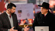 Ohio State head coach Ryan Day talks to Nick Saban on the set of ESPN College GameDay prior to the College Football Playoff first round game between the Ohio State Buckeyes and Tennessee Volunteers in Columbus on Dec. 21, 2024.