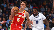 Mar 3, 2025; Memphis, Tennessee, USA; Atlanta Hawks guard Dyson Daniels (5)drives to the basket as Memphis Grizzlies guard Vince Williams Jr. (5) defends during the second quarter at FedExForum. Mandatory Credit: Petre Thomas-Imagn Images
