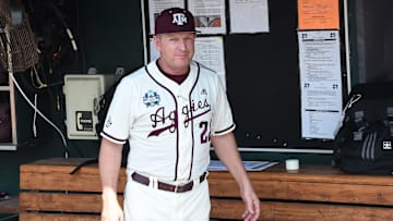 Jun 19, 2022; Omaha, NE, USA; Texas A&M Aggies head coach Jim Schlossnagle in the dugout before