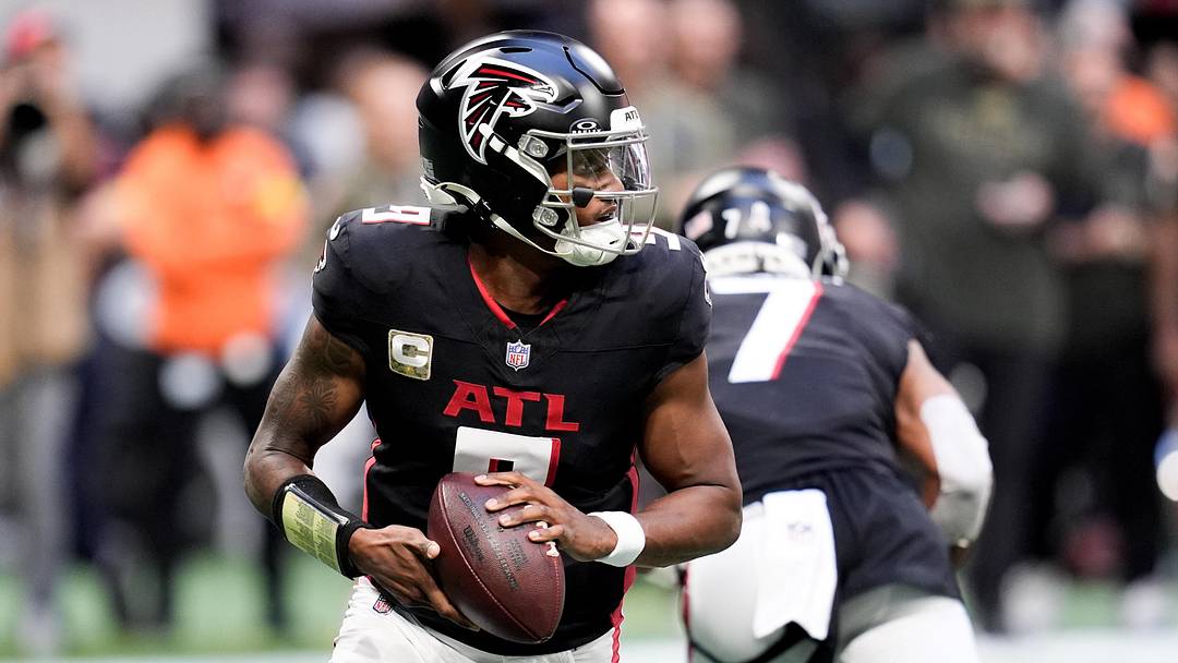 Nov 16, 2025; Atlanta, Georgia, USA; Atlanta Falcons quarterback Michael Penix Jr. (9) looks for an open receiver in the second half against the Carolina Panthers at Mercedes-Benz Stadium. Mandatory Credit: Dale Zanine-Imagn Images