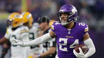 Minnesota Vikings safety Camryn Bynum (24) celebrates recovering a fumble by Green Bay Packers running back Josh Jacobs (8) in the first quarter during their football game Sunday, December 29, 2024, at U.S. 