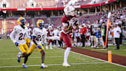 Nov 1, 2025; Stanford, California, USA; Stanford Cardinal wide receiver CJ Williams (3) scores a touchdown against the Pittsburgh Panthers during the fourth quarter at Stanford Stadium. Mandatory Credit: John Hefti-Imagn Images