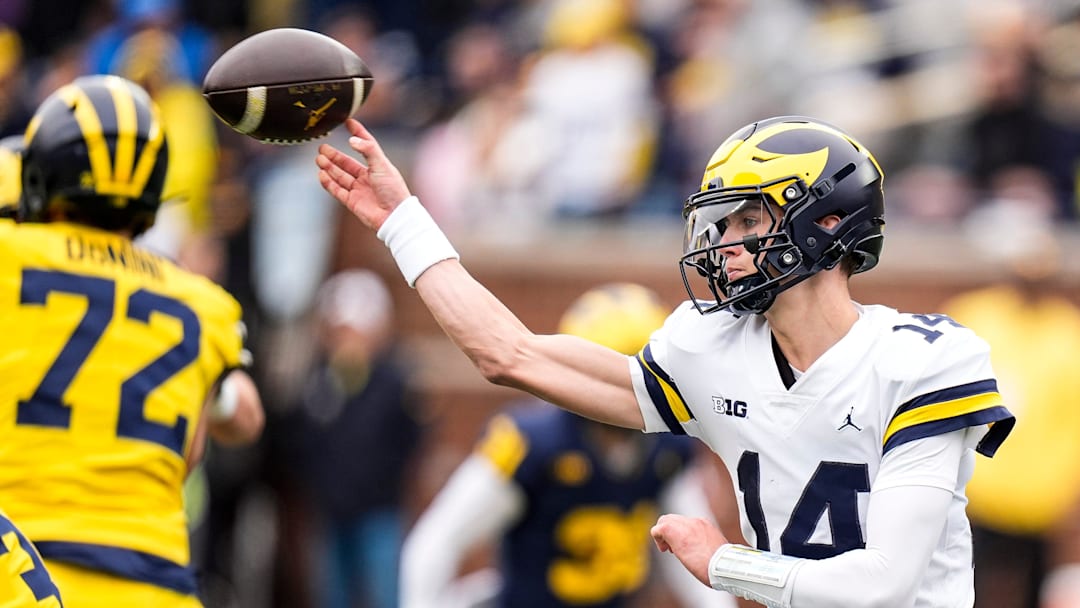 Michigan quarterback Tommy Carr (14) makes a pass during the spring game at Michigan Stadium in Ann Arbor on Saturday, April 18, 2026.