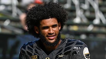 Sep 20, 2025; Eugene, Oregon, USA; Oregon Ducks quarterback Dante Moore (5) warms up before the game against the Oregon State Beavers at Autzen Stadium. Mandatory Credit: Troy Wayrynen-Imagn Images