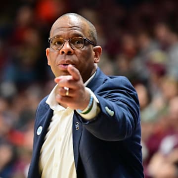 Mar 4, 2025; Blacksburg, Virginia, USA;  North Carolina Tar Heels head coach Hubert Davis points at a player during the second half against Virginia Tech Hokies at Cassell Coliseum. Mandatory Credit: Brian Bishop-Imagn Images