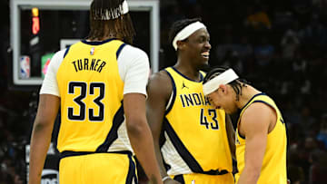 Jan 12, 2025; Cleveland, Ohio, USA; Indiana Pacers guard Andrew Nembhard (2) celebrates with forward Pascal Siakam (43) and center Myles Turner (33) after a basket during the second half against the Cleveland Cavaliers at Rocket Mortgage FieldHouse. Mandatory Credit: Ken Blaze-Imagn Images