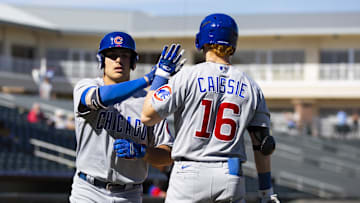Oct 26, 2022; Surprise, Arizona, USA; Chicago Cubs outfielder Matt Mervis (left) celebrates a home