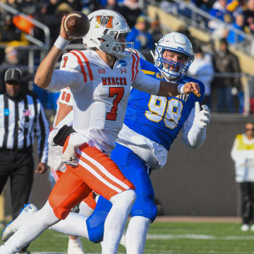 Mercer's quarterback Carter Peevy (7) throws the ball to a teammate on Saturday, Dec. 2, 2023 at Dana J Dykhouse Stadium in Brookings.