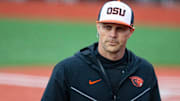 Oregon State head coach Mitch Canham returns to the dugout duringÊthe NCAA college baseball game at Goss Stadium on Friday,ÊApril 26, 2024, in Corvallis, Ore.