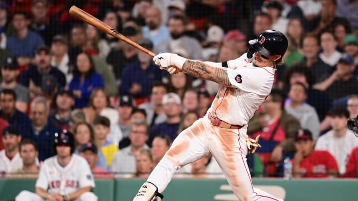 Jun 16, 2024; Boston, Massachusetts, USA; Boston Red Sox left fielder Jarren Duran (16) hits a single against the New York Yankees during the eighth inning at Fenway Park. Mandatory Credit: Eric Canha-USA TODAY Sports