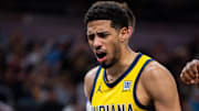 Apr 4, 2025; Indianapolis, Indiana, USA; Indiana Pacers guard Tyrese Haliburton (0) reacts to a basket and foul in the second half against the Utah Jazz at Gainbridge Fieldhouse. Mandatory Credit: Trevor Ruszkowski-Imagn Images