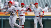 Angels shortstop Jose Iglesias (4) celebrates with second baseman David Fletcher (22) after the game against the Detroit Tigers at Comerica Park on Aug. 19, 2021.