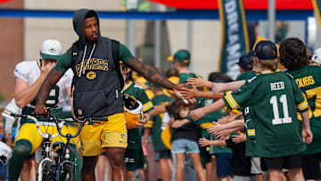 Green Bay Packers wide receiver Matthew Golden slaps hands with young fans as he walks to practice on Thursday, July 31, 2025, at Lambeau Field in Green Bay, Wis. 
Tork Mason/USA TODAY NETWORK-Wisconsin