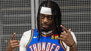 Nov 17, 2025; New Orleans, Louisiana, USA;  Oklahoma City Thunder guard Luguentz Dort (5) poses for a picture after the game against the New Orleans Pelicans at Smoothie King Center. Mandatory Credit: Stephen Lew-Imagn Images