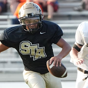 St. Thomas Aquinas varsity football scrimmages Strasburg at St. Thomas Friday, August 15, 2025. The Raiders brace for a home game with two-time defending national champion Mater Dei of Santa Ana (Calif.) on Saturday
