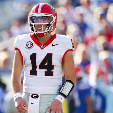 Nov 1, 2025; Jacksonville, Florida, USA; Georgia Bulldogs quarterback Gunner Stockton (14) looks on in the second quarter against the Florida Gators at EverBank Stadium. Mandatory Credit: Matt Pendleton-Imagn Images