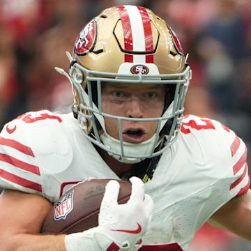 Oct 26, 2025; Houston, Texas, USA; San Francisco 49ers running back Christian McCaffrey (23) runs for a gain during the second half against the Houston Texans at NRG Stadium. Mandatory Credit: Sean Thomas-Imagn Images