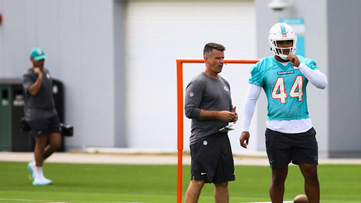 Miami Dolphins linebacker Chop Robinson (44) works out during mandatory minicamp at Baptist Health Training Complex.