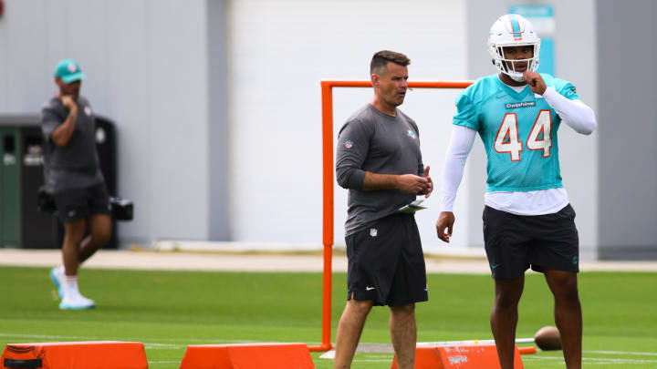 Miami Dolphins linebacker Chop Robinson (44) works out during mandatory minicamp at Baptist Health Training Complex.