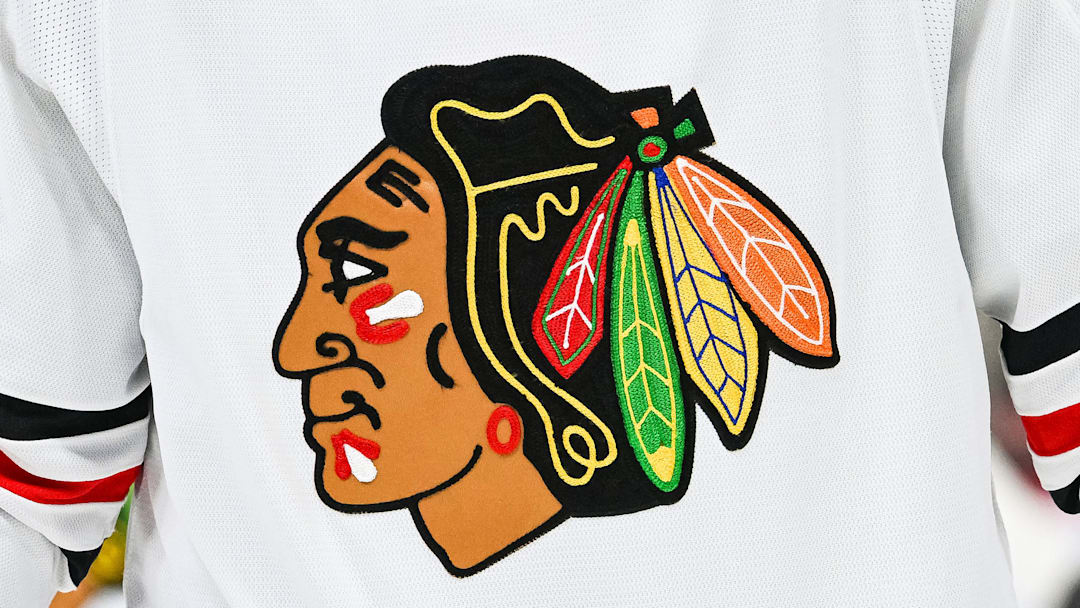 Feb 14, 2023; Montreal, Quebec, CAN; View of a Chicago Blackhawks logo on a jersey worn by a member of the team against the Montreal Canadiens during the third period at Bell Centre. Mandatory Credit: David Kirouac-Imagn Images