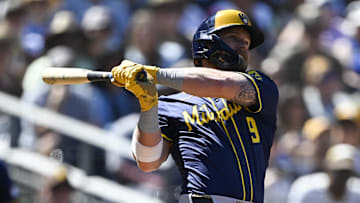 Sep 24, 2025; San Diego, California, USA; Milwaukee Brewers left fielder Jake Bauers (9) hits a double during the second inning against the San Diego Padres at Petco Park. Mandatory Credit: Denis Poroy-Imagn Images