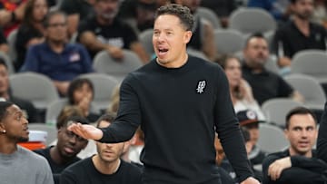 Oct 17, 2025; San Antonio, Texas, USA; San Antonio Spurs head coach Mitch Johnson argues a call with an official during the first half against the Indiana Pacers at Frost Bank Center. Mandatory Credit: Scott Wachter-Imagn Images