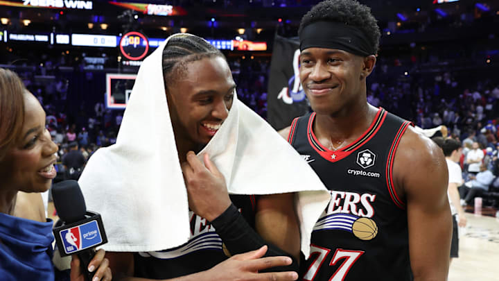 Apr 15, 2026; Philadelphia, Pennsylvania, USA; Philadelphia 76ers guard Tyrese Maxey (0) celebrates with guard Vj Edgecombe (77) after a win against the Orlando Magic in a play-in round of the 2026 NBA Playoffs at Xfinity Mobile Arena. Mandatory Credit: Bill Streicher-Imagn Images