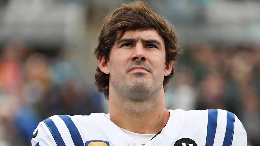 Indianapolis Colts quarterback Daniel Jones (17) stands on the field during the National Anthem.