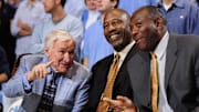 Feb 7, 2009; Chapel Hill, NC, USA; North Carolina Tar Heels former head coach Dean Smith and former players James Worthy and Bob McAdoo are honored for their Hall of Fame careers during a halfime ceremony during the Tar Heels 76-61 victory against the Cavaliers at the Dean E. Smith Center. Mandatory Credit: Bob Donnan-Imagn Images