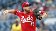 Aug 23, 2024; Pittsburgh, Pennsylvania, USA;  Cincinnati Reds starting pitcher Buck Farmer (46) delivers a pitch against the Pittsburgh Pirates during the first inning at PNC Park. Mandatory Credit: Charles LeClaire-Imagn Images