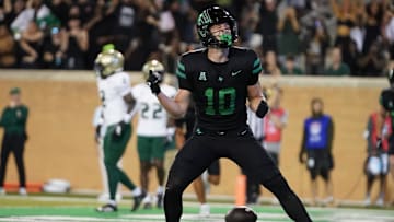 Oct 10, 2025; Denton, Texas, USA; North Texas Mean Green wide receiver Wyatt Young (10) reacts after scoring a touchdown against the South Florida Bulls during the first half of a game at DATCU Stadium. Mandatory Credit: Raymond Carlin III-Imagn Images