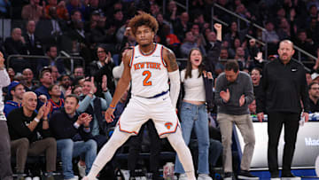 Feb 3, 2025; New York, New York, USA; New York Knicks guard Miles McBride (2) reacts after making a three point basket during the second half against the Houston Rockets at Madison Square Garden. Mandatory Credit: Vincent Carchietta-Imagn Images