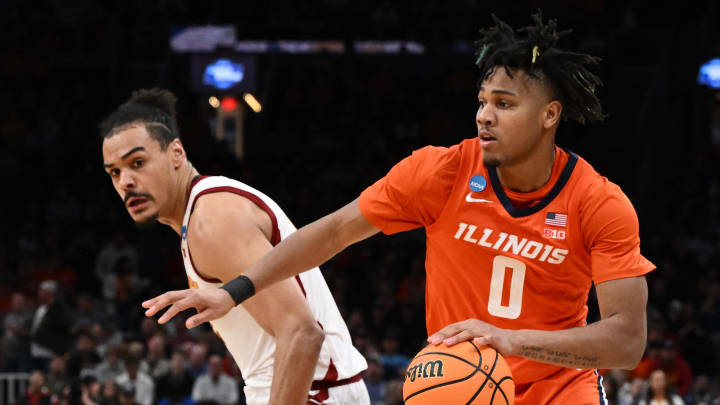 Mar 28, 2024; Boston, MA, USA; Illinois Fighting Illini guard Terrence Shannon Jr. (0) dribbles the ball against the Iowa State Cyclones in the semifinals of the East Regional of the 2024 NCAA Tournament at TD Garden. Mandatory Credit: Brian Fluharty-USA TODAY Sports