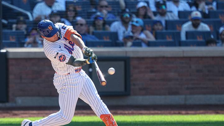 May 17, 2026; New York City, New York, USA; New York Mets center fielder Tyrone Taylor (28) hits a three run home run during the ninth inning against the New York Yankees at Citi Field. Mandatory Credit: Vincent Carchietta-Imagn Images