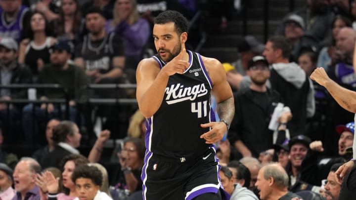 Mar 31, 2024; Sacramento, California, USA; Sacramento Kings forward Trey Lyles (41) gestures after scoring against the Utah Jazz during the fourth quarter at Golden 1 Center. Mandatory Credit: Darren Yamashita-USA TODAY Sports