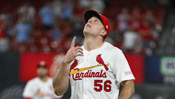 Jul 24, 2025; St. Louis, Missouri, USA;  St. Louis Cardinals relief pitcher Ryan Helsley (56) celebrates after the Cardinals defeated the San Diego Padres at Busch Stadium. Mandatory Credit: Jeff Curry-Imagn Images