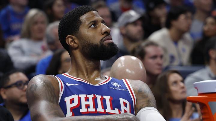 Dec 28, 2025; Oklahoma City, Oklahoma, USA; Philadelphia 76ers forward Paul George (8) watches the end of the fourth quarter from the bench against the Oklahoma City Thunder during the second half at Paycom Center. Mandatory Credit: Alonzo Adams-Imagn Images