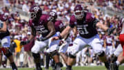 Sep 18, 2021; College Station, Texas, USA; Texas A&M Aggies offensive lineman Kenyon Green (55) and offensive lineman Bryce Foster (61) in action during the game between the Texas A&M Aggies and the New Mexico Lobos at Kyle Field. Mandatory Credit: Jerome Miron-USA TODAY Sports