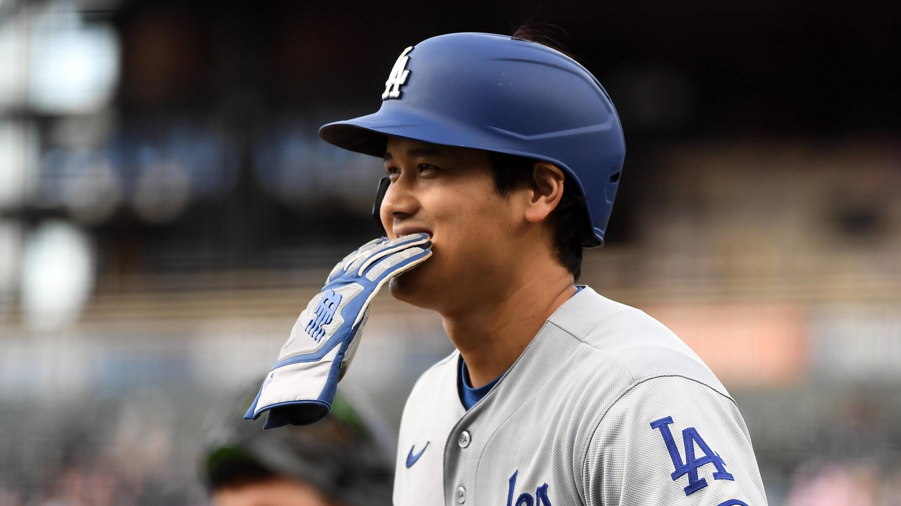 Los Angeles Dodgers designated hitter Shohei Ohtani (17) after scoring during the first inning against the Colorado Rockies at Coors Field on April 18, 2026.