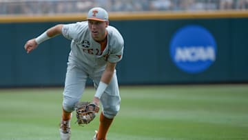 Jun 17, 2018; Omaha, NE, USA; Texas Longhorns second baseman Kody Clemens (2) picks up a ground ball in the second inning against the Arkansas Razorbacks during the College World Series at TD Ameritrade Park