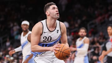 Mar 23, 2025; Atlanta, Georgia, USA; Atlanta Hawks forward Georges Niang (20) drives to the basket against the Philadelphia 76ers in the fourth quarter at State Farm Arena. Mandatory Credit: Brett Davis-Imagn Images
