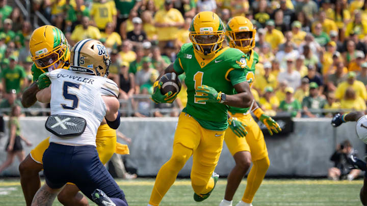 Oregon wide receiver Dakorien Moore carries the ball as the Oregon Ducks host the Montana State Bobcats on Aug. 30, 2025, at Autzen Stadium in Eugene, Oregon.
