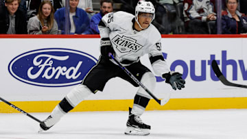 Nov 13, 2024; Denver, Colorado, USA; Los Angeles Kings right wing Quinton Byfield (55) controls the puck in the first period against the Colorado Avalanche at Ball Arena. Mandatory Credit: Isaiah J. Downing-Imagn Images