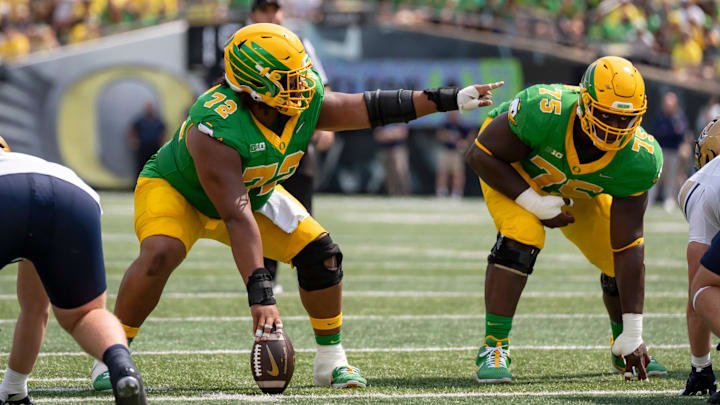 Iapani Laloulu and Emmanuel Pregnon provided the foundation for the 2026 offensive line. The discipline and communication fueled a 13-2 season.