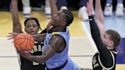 Marquette guard Kam Jones (1) scores during the second half of their game Tuesday, November 19, 2024 at Fiserv Forum in Milwaukee, Wisconsin. Marquette beat Purdue 76-58.