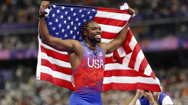 Aug 4, 2024; Paris Saint-Denis, France; Noah Lyles (USA) celebrates after winning the menís 100m final during the Paris 2024 Olympic Summer Games at Stade de France. 