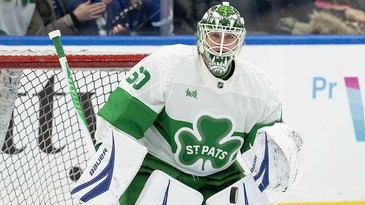 Mar 17, 2026; Toronto, Ontario, CAN; Toronto Maple Leafs goaltender Joseph Woll (60) takes pucks during the warmup before a game against the New York Islanders at Scotiabank Arena. 