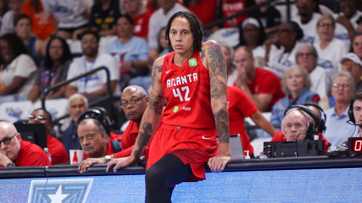 Sep 14, 2025; College Park, Georgia, USA; Atlanta Dream center Brittney Griner (42) waits to enter a game against the Indiana Fever in the first quarter during game one of round one for the 2025 WNBA Playoffs at Gateway Center Arena at College Park. Mandatory Credit: Brett Davis-Imagn Images
