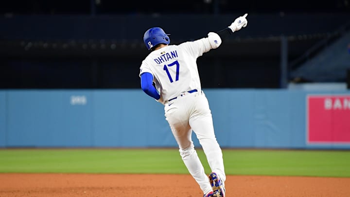 Apr 2, 2025; Los Angeles, California, USA; Los Angeles Dodgers designated hitter Shohei Ohtani (17) rounds the bases after hitting a walk off solo home run against the Atlanta Braves during the ninth inning at Dodger Stadium. Mandatory Credit: Gary A. Vasquez-Imagn Images Apr 2, 2025; Los Angeles, California, USA; Los Angeles Dodgers designated hitter Shohei Ohtani (17) rounds the bases after hitting a walk off solo home run against the Atlanta Braves during the ninth inning at Dodger Stadium. Mandatory Credit: Gary A. Vasquez-Imagn Images