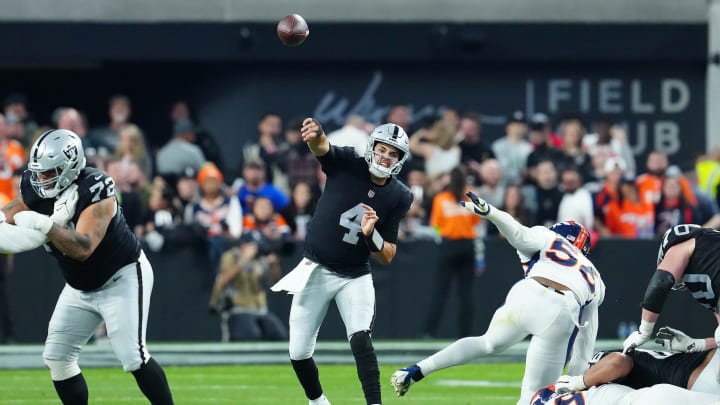 Jan 7, 2024; Paradise, Nevada, USA; Las Vegas Raiders quarterback Aidan O'Connell (4) throws against the Denver Broncos during the fourth quarter at Allegiant Stadium. Mandatory Credit: Stephen R. Sylvanie-USA TODAY Sports